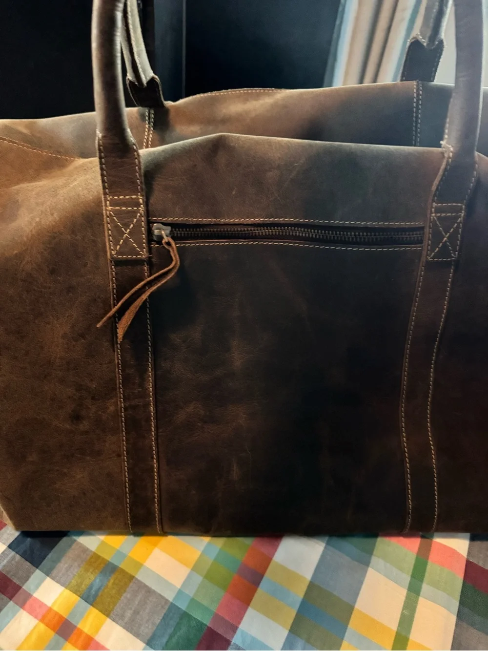 Brown Leather duffel bag.